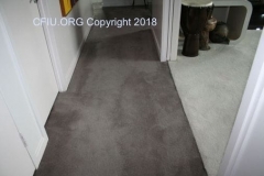 carpet pooling in hallway